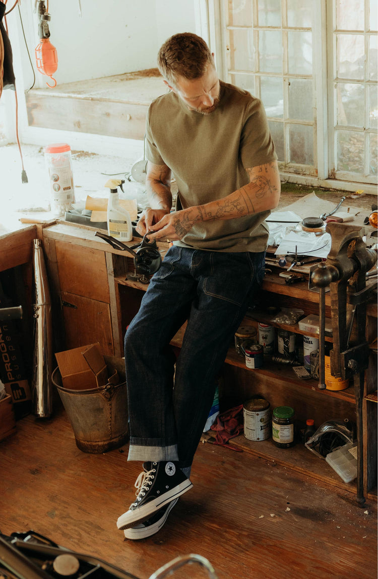 fit model posing in The Organic Cotton Shop Tee in Army Twist
