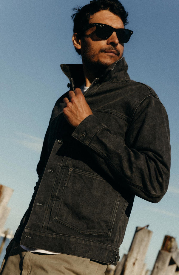 fit model posing in The Ryder Jacket in Coal Chipped Canvas