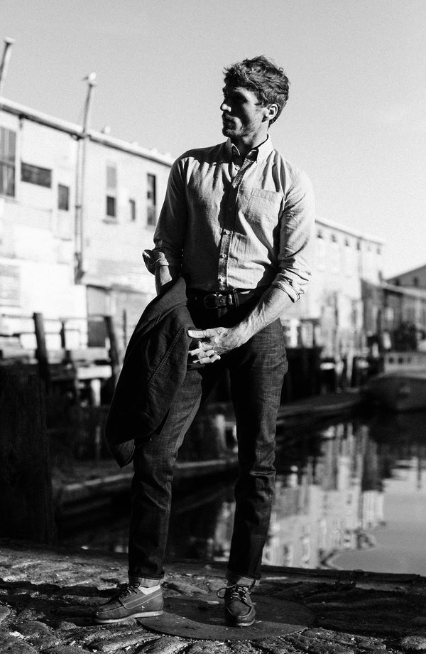 our fit model wearing the slim jean, cropped shot with text on the right