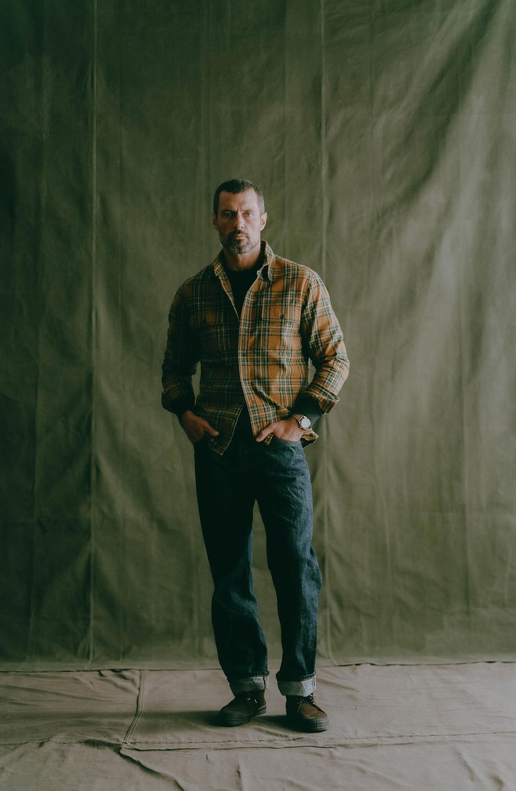 fit model sitting on The Straight Jean in Rigid Organic Selvedge