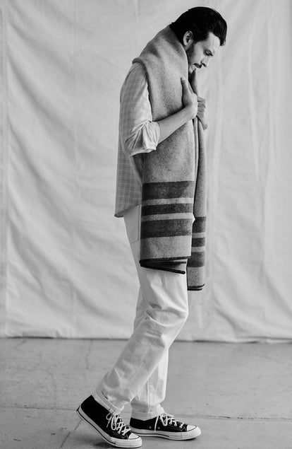 fit model showing off the sides of The Wool Blanket in Bay Stripe