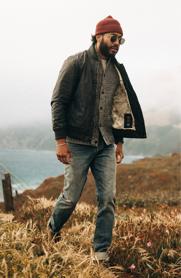 our fit model wearing the bomber, outside