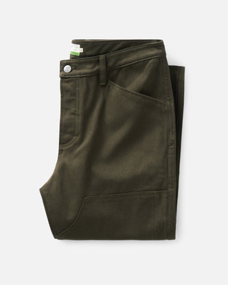folded flatlay of The Good Acre Chore Pant in Olive Canvas