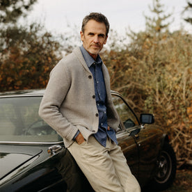 fit model leaning against a car in The Crawford Sweater in Ash Twist