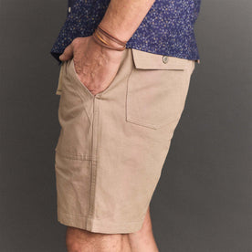 fit model showing off the back pockets on The Apres Trail Short in Dried Earth Slub