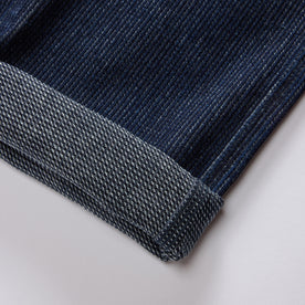 material shot of the cuffs on The Morse Pant in Rinsed Indigo Stripe