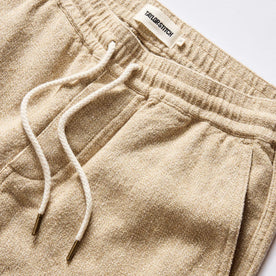 material shot of the drawcords on The Apres Pant in Oat Linen Tweed