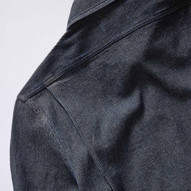 material shot of the shoulder on The Utility Shirt in Rinsed Indigo Stripe