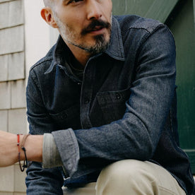 fit model showing the texture on The Utility Shirt in Rinsed Indigo Stripe