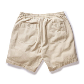 material shot of the back pocket on The Apres Short in Organic Aged Stone Foundation Twill