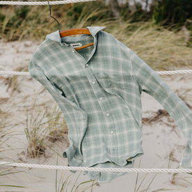 material shot of The California in Sea Moss Plaid on a hanger in the wind