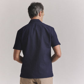 fit model showing off the back of The Conrad Shirt in Rinsed Indigo Pickstitch