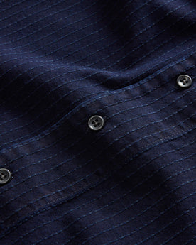 material shot of the buttons on The Conrad Shirt in Rinsed Indigo Pickstitch, Wovens by Taylor Stitch
