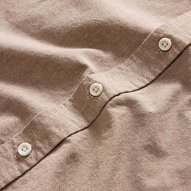material shot of the natural-colored buttons on The Jack in Faded Brick Chambray