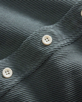 material shot of the buttons on The Ledge Shirt in Deep Sea Twill, Wovens by Taylor Stitch