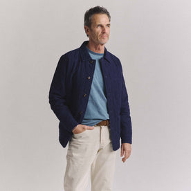 fit model posing in The Ojai Jacket in Indigo Diamond Quilt