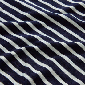 material shot of stripe detailing on The Organic Cotton Henley in Rinsed Indigo Stripe