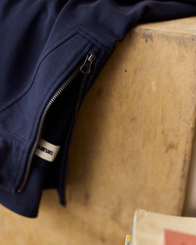editorial image of the zipper on The Rugby Quarter Zip in Faded Navy, Knits by Taylor Stitch