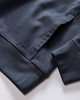 material shot of the pocket on The Rugby Quarter Zip in Faded Navy, Knits by Taylor Stitch