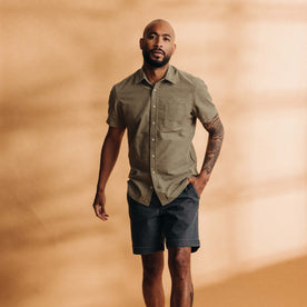 fit model posing in The Short Sleeve California in Heather Moss Cord