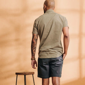fit model showing off the back of The Short Sleeve California in Heather Moss Cord