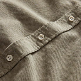 material shot of the buttons on The Short Sleeve California in Heather Moss Cord