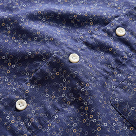 material shot of the buttons on The Short Sleeve Hawthorne in Dark Navy Floral