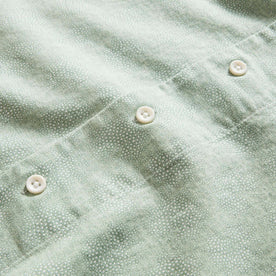 material shot of the buttons on The Short Sleeve Hawthorne in Sea Moss Floral