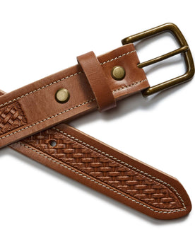 flatlay of the clasp on The Tooled Belt in Saddle Tan, Accessories by Taylor Stitch