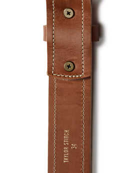 flatlay of the back stitching on The Tooled Belt in Saddle Tan, Accessories by Taylor Stitch