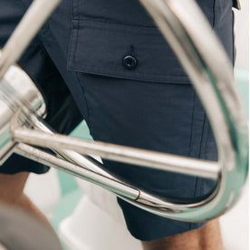 fit model showing off pocket detailing on The Trail Cargo Short in Faded Navy 60/40 Faille