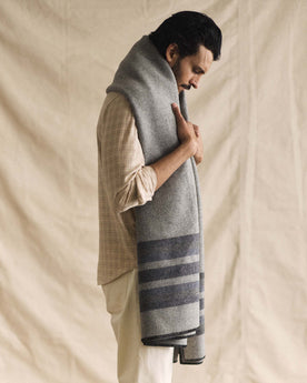 fit model showing off The Wool Blanket in Bay Stripe, Accessories by Taylor Stitch