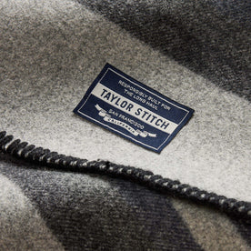 material shot of the tag on The Wool Blanket in Bay Stripe