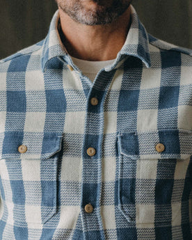 editorial flatlay of the pocket on The Division Shirt in Washed Indigo Check, Wovens by Taylor Stitch