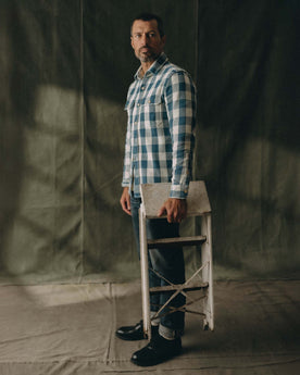 editorial flatlay of the sleeve on The Division Shirt in Washed Indigo Check, Wovens by Taylor Stitch
