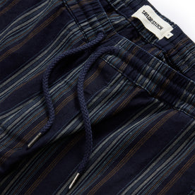 material shot of the drawcords on The Apres Short in Indigo Stripe
