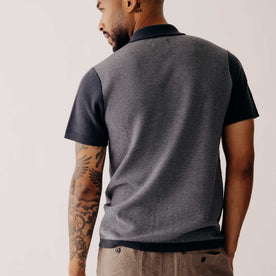 fit model showing the back of The Button Down Polo in Marine Seed Stitch