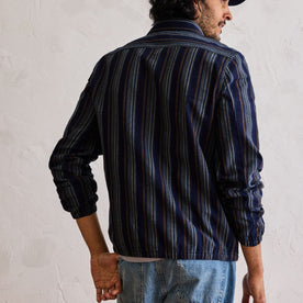 fit model showing the back of The Clark Jacket in Indigo Stripe