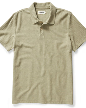 flatlay of The Herringbone Polo in Heather Sage, Knits by Taylor Stitch