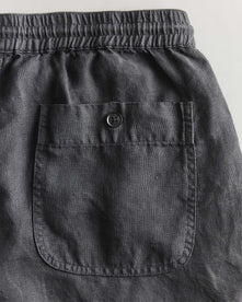 material shot of the back pocket on The Apres Short in Faded Black Hemp