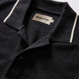 material shot of the collar on The Button Down Polo in Coal Herringbone