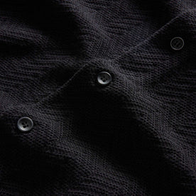 material shot of the buttons on The Button Down Polo in Coal Herringbone