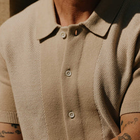 fit model showing off texture on The Button Down Polo in Faded Khaki Seed Stitch