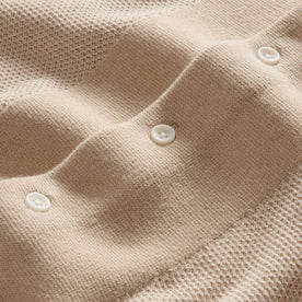 material shot of the buttons on The Button Down Polo in Faded Khaki Seed Stitch