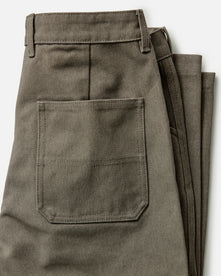 material shot of the button fly on The Camp Pant in Stone Chipped Canvas