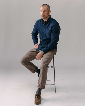 fit model with his hand in his pocket wearing The Jack in Indigo Waffle, Wovens by Taylor Stitch