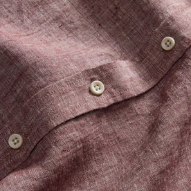 material shot of the buttons on The Short Sleeve California in Dried Cherry Hemp