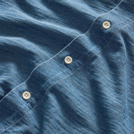 material shot of the buttons on The Short Sleeve California in Washed Indigo Slub
