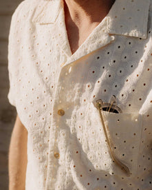 fit model showing off the pocket on The Short Sleeve Hawthorne in Vintage White Embroidered Eyelet