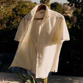 editorial image of The Short Sleeve Hawthorne in Vintage White Embroidered Eyelet on a hanger